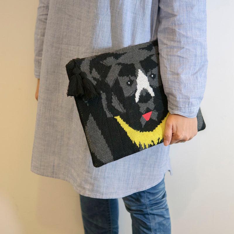 Knitted moon bear clutch